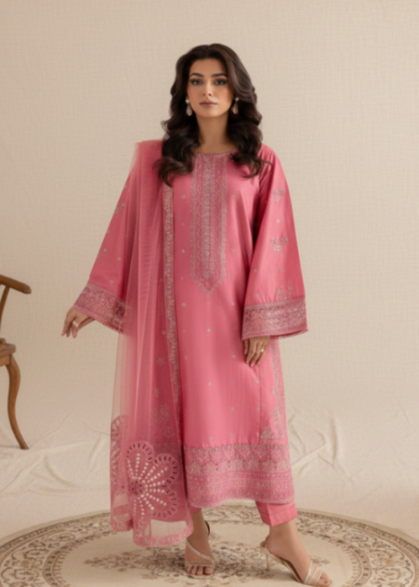 Woman wearing a pink embroidered traditional outfit on a white background